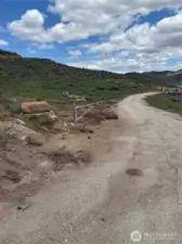 Once you have arrived at the top, there is a RE sign at the gated entrance onto the property.