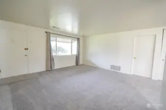 Living Room shown without virtual staging. Note: Gas Furnace