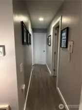 The hallway from the living space to bedrooms and baths