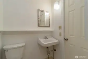 Main level 3/4 bath with new toilet and sink