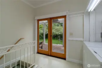Laundry just off of kitchen, double doors to deck.