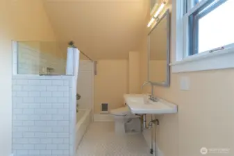 Thoughtfully update full bath on upper level