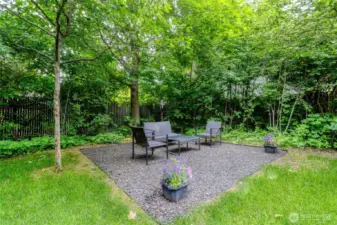 Outdoor seating area under the Hawthorne canopy.