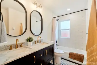 Guest bath with beautiful designer features.