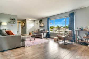 Kick back in the roomy living room, where big windows serve up jaw-dropping Mt. Rainier views!