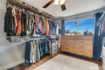 The third main-floor bedroom, currently a versatile flex space for the seller, adapts effortlessly to your needs.