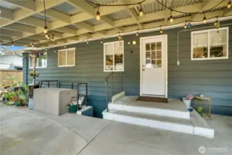 Enjoy seamless flow from the kitchen to the covered patio or downstairs basement, making entertaining and everyday living a breeze with effortless access.