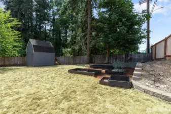 Garden beds and shed.