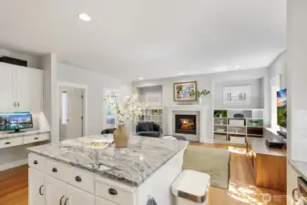 Bonus room off of kitchen with tile fireplace