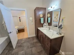 Primary Bathroom with custom cabinets and Quartz Counters