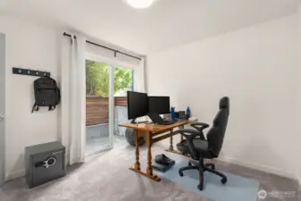 Lower level office with sliders to patio.