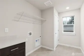 Laundry located on upper level.