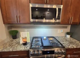 Newer Gas cooktop stove and space for everything.