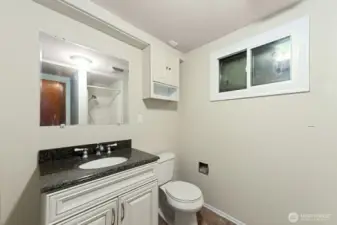 Downstairs bedroom with 3/4 bath attached.