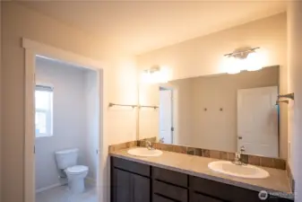 upstairs full bathroom with double sinks