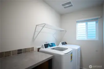 laundry room upstairs for convenience