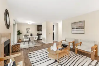 Seamless blend of living room with a clear dining room eating space.
