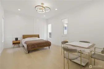 Spacious main level bedroom with ensuite bathroom.
