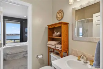 Main floor bathroom #3 Jack & Jill layout between guest bedroom and hall.