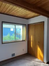 Second guest bedroom also with warm wood ceilings. You will find wood ceilings in every room on the main floor...