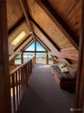 At the top of the stairs is a loft with day bed and amazing view...
