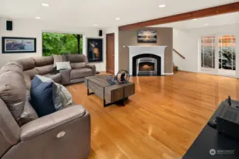 Main living room area.  Gleaming hardwood floors and gas fireplace.