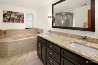 Remodeled bathroom with beautiful stone tiling.