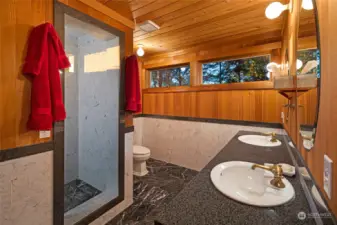 The ensuite bathroom of guestroom #2 has heated marble floors and a dual vanity.