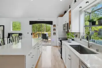 Kitchen flows out to a large deck