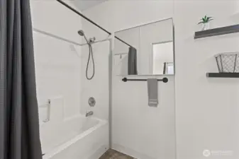 Primary Bathroom, vanity and toilet behind the door to the right.