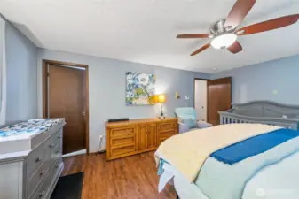 A view from the corner of the primary shows the flexible space with plenty of art or photo walls waiting for your special moments and cherished displays.