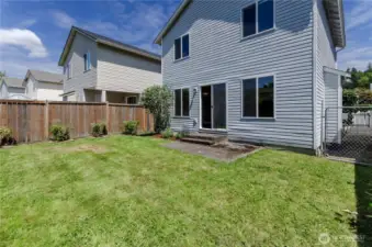 Fully fenced backyard, plenty of sun, western exposure, has A/C!