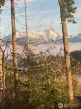 View of Olympic Mtns over Hood Canal's "Great Bend". zoomed in.