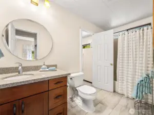 Additional Full Bath off Laundry Room/Carport Entry.