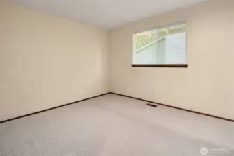 One of  two upstairs bedrooms with big closet.