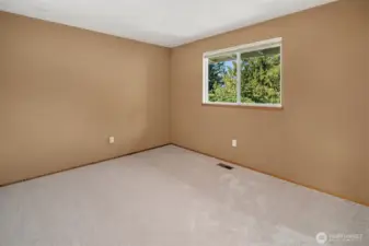 Another 2nd level bedroom with a view of the Cascade foothills.