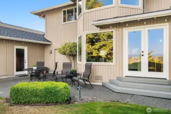 Patio is tucked in next to the home but opens up to private backyard with views of the foothills.