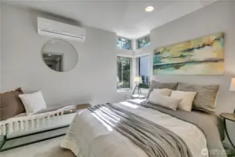 Second level feels almost like another primary suite, with large bedroom, full bath, laundry, and a versatile 3rd bedroom or office, all on the same floor