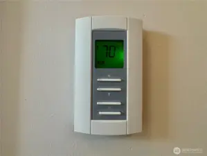 Both bathrooms have heated tile flooring