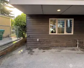 Sheltered parking with electrical outlet