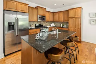 Spacious kitchen with open concept to living spaces.