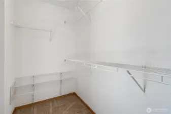 Walk-in closet off primary bedroom