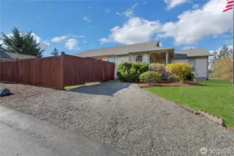 Extra parking off-street on East side of the home