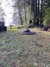 A nice fire pit and bbq station currently sits in the middle of the property.