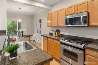 Stainless steel appliances in kitchen.