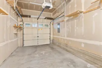 Attached garage with storage.