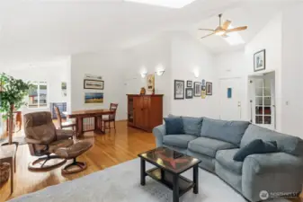 Living Room and Dining Room. Just beyond the large hutch is a door to the double garage.