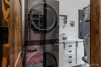 Laundry pass through off the Primary to the mud room and garage