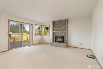 Family room looking towards the slider and the brand new deck.