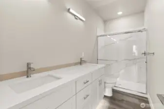 Images shown are from a different home previously constructed by this builder and are provided as examples of workmanship, finish quality, and design style only. The subject property is currently under construction, and specific materials, colors, fixtures, and features may differ upon completion.